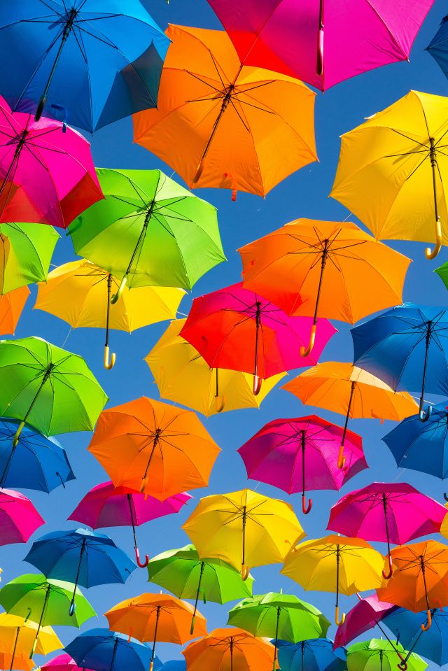 colourful umbrellas in the sky